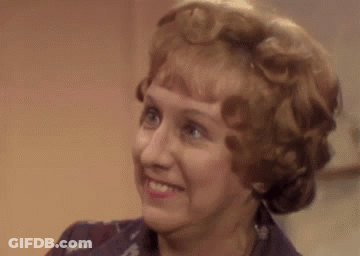 Woman Making Funny Face While Smiling GIF