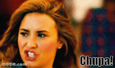 Woman Making Funny Face With Chupa GIF
