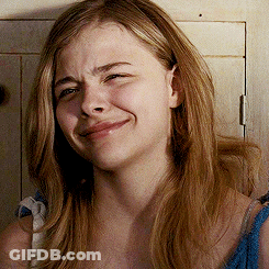 Woman Making Funny Face With Eyes Closed GIF