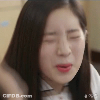 Woman Making Funny Face With Eyes Closed And Mouth Open GIF