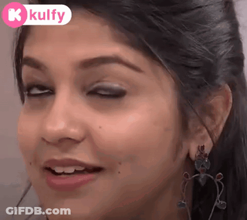 Woman Making Funny Face With Eyes Closed GIF