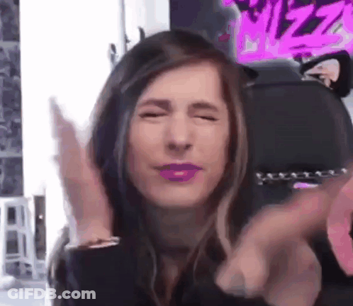 Woman Making Funny Face With Eyes Closed GIF