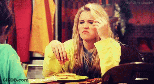 Woman Making Funny Face With Food GIF
