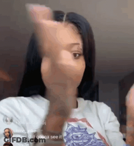 Woman Making Funny Face With Hand GIF