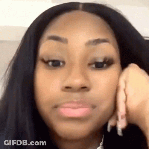 Woman Making Funny Face With Hand On Chin GIF