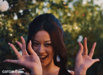 Woman Making Funny Face With Hands GIF