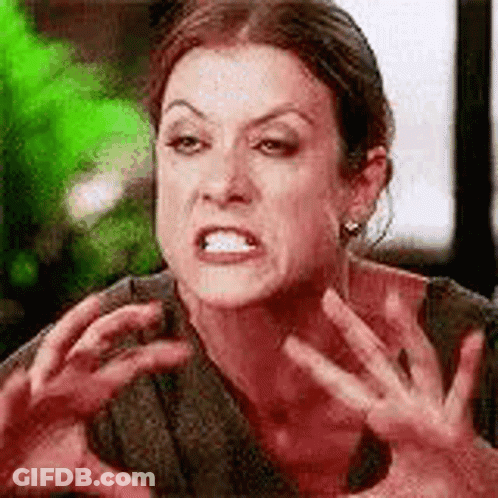 Woman Making Funny Face With Hands In Air GIF