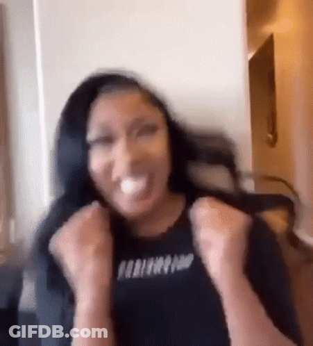Woman Making Funny Face With Hands In Air GIF
