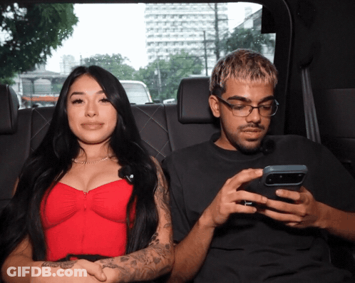 Woman Making Funny Face With Hoop Earrings GIF