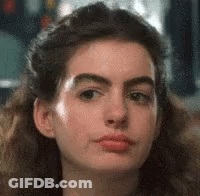 Woman Making Funny Face With Long Hair GIF