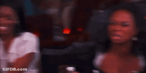 Woman Making Funny Face With Ser GIF