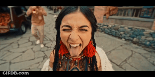 Woman Making Funny Face With Tongue Out GIF