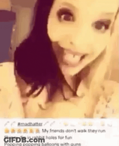 Woman Making Funny Face With Tongue Out Holding Rabbit GIF