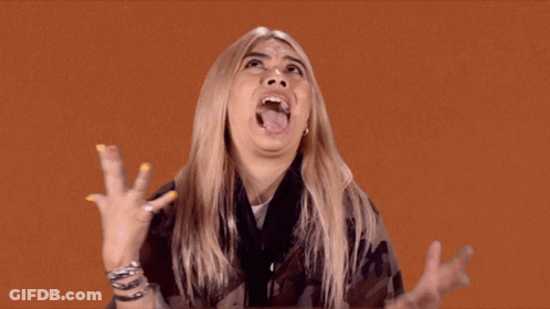 Woman Making Funny Face With Tongue Out GIF