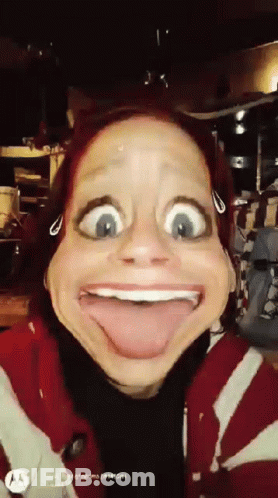 Woman Making Funny Face With Tongue Out GIF