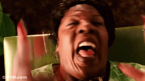 Woman Making Funny Face With Tongue Out GIF