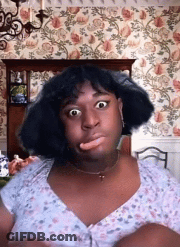 Woman Making Funny Face With Tongue Out GIF