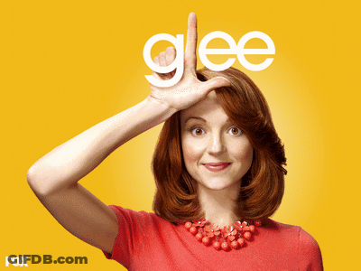 Woman Making Glee Hand Gesture GIF