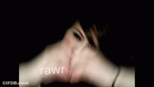 Woman Making Heart Hands With Rawr GIF