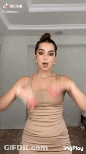 Woman Making Heart Shape With Hands GIF