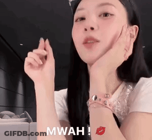 Woman Making Heart Shape With Hands Wearing Watch And Bracelet GIF