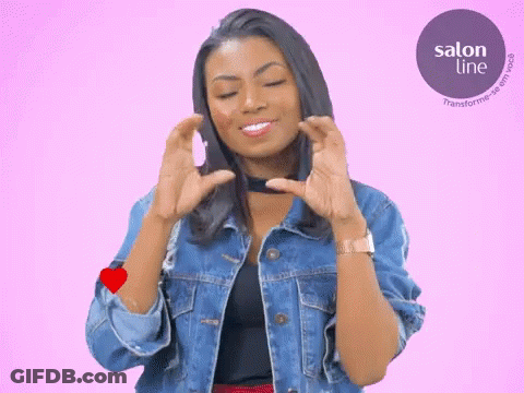Woman Making Heart Shape With Hands GIF