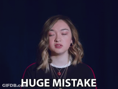 Woman Making Huge Mistake Sign With Eyes Closed GIF