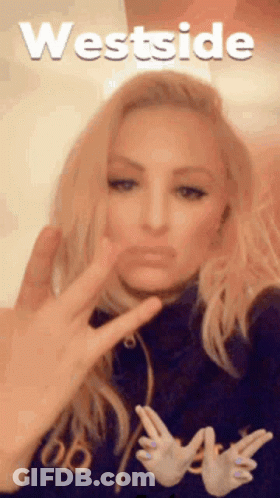 Woman Making Peace Sign In Westside Sweatshirt GIF