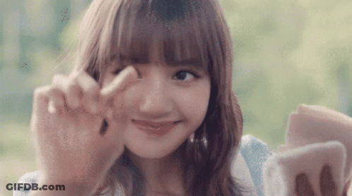 Woman Making Peace Sign GIF