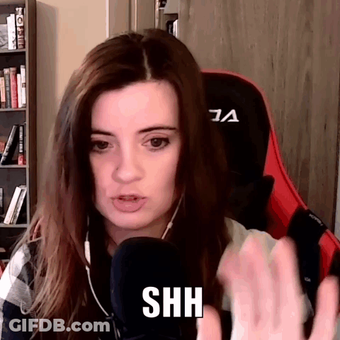 Woman Making Shh Gesture GIF