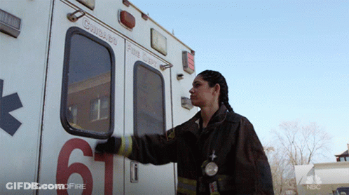 Woman Next To Ambulance Number 6 GIF
