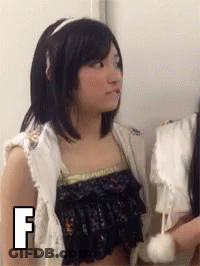 Woman Next To Another Woman With Letter F GIF