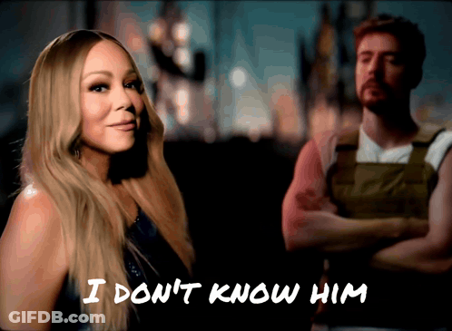 Woman Next To Man Saying I Don't Know Him GIF