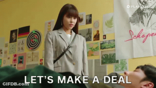 Woman Next To Man Saying Let's Make A Deal GIF