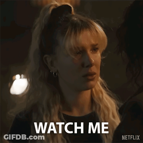 Woman Next To Man Saying Watch Me GIF