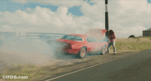 Woman Next To Red Car With Hood Up GIF