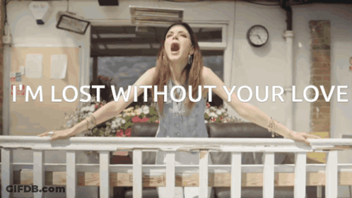Woman On Balcony With I'm Lost Without Your Love GIF