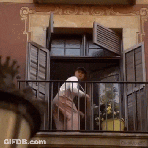 Woman On Balcony With Open Shutters Creepy GIF