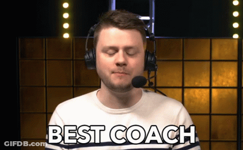 Woman On Balcony With Sign Coach Mek Wishes You Strength And Joy In The New Year GIF