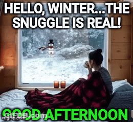 Woman On Bed Looking Out Window With Snowman GIF