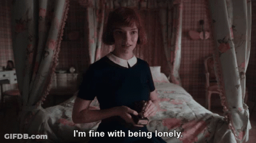 Woman On Bed Saying I'm Fine With Being Lonely GIF