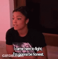 Woman On Bed Talking About Fighting GIF