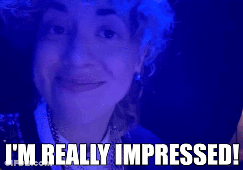 Woman On Blue Background Saying I'm Really Impressed GIF