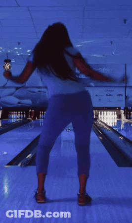 Woman On Bowling Alley In Front Of Hard Rock Sign GIF