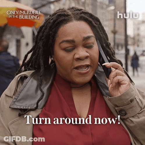 Woman On Cell Phone Saying Turn Around Now GIF