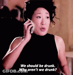 Woman On Cell Phone Saying We Should Be Drunk GIF