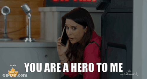 Woman On Cell Phone Saying You Are A Hero To Me GIF