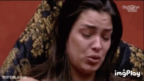 Woman On Couch Making Funny Face GIF