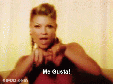 Woman On Couch Making Heart Says Me Gusta GIF