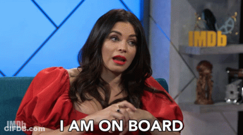 Woman On Couch Saying I Am On Board GIF